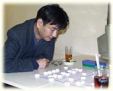 Master Woo playing against XieXie