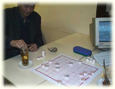 Master Woo playing against XieXie